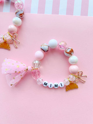 Croissant and Bow Kids Beaded Charm Bracelet: Child 6”