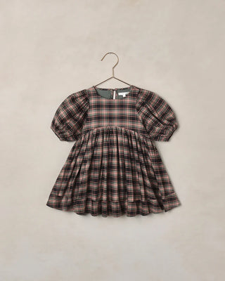 Noralee Luna Dress in green and black Tartan with puff sleeves and a babydoll skirt, on a hanger