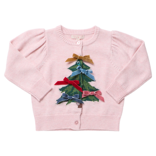 Pink Chicken Constance Cardigan in light pink knit with a sparkly green Christmas tree trimmed in velvet bows, puff shoulders and glitter buttons