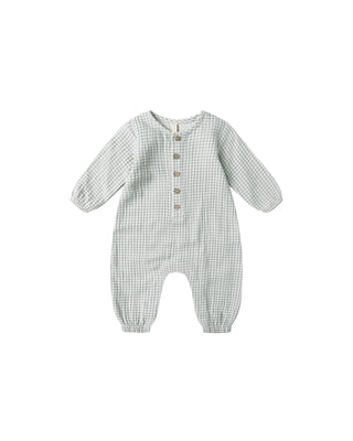 Checkered baby onesie with buttons on a white background