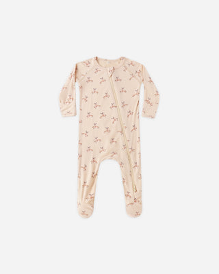 Baby onesie with floral pattern on a white background