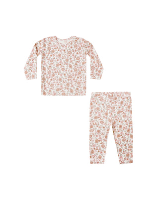 Floral pajama set with top and pants on a white background