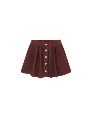 Maroon skirt with button details on a white background