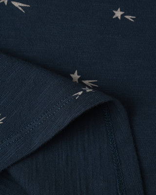 Navy fabric with small white star patterns