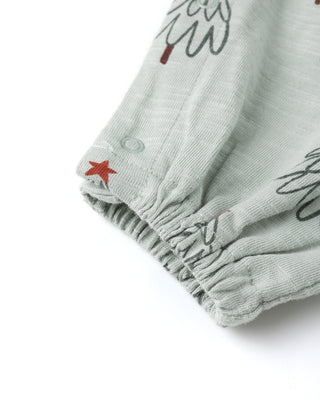 Light gray baby romper with leaf and star patterns on a white background