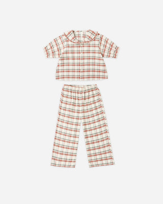 Plaid pajama set with shirt and pants on a white background