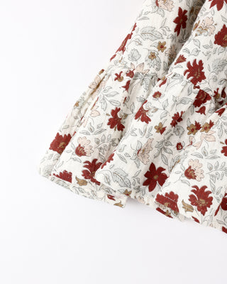 Floral fabric with red and brown flowers on a white background
