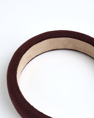 Close-up of a brown and beige circular object on a white background