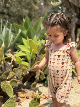 Tegan Cow Print Bubble Romper – Ruffle Shoulder Baby One - Piece - Lindsey Paige